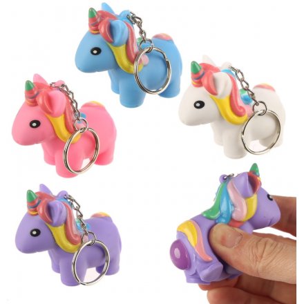 An assortment of 4 Squeezy Unicorn Pooping keyrings