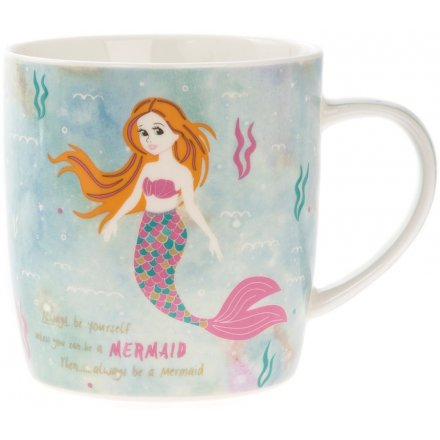   A fabulous little ceramic mug covered in an underwater themed print, perfectly finished with a mermaid 
