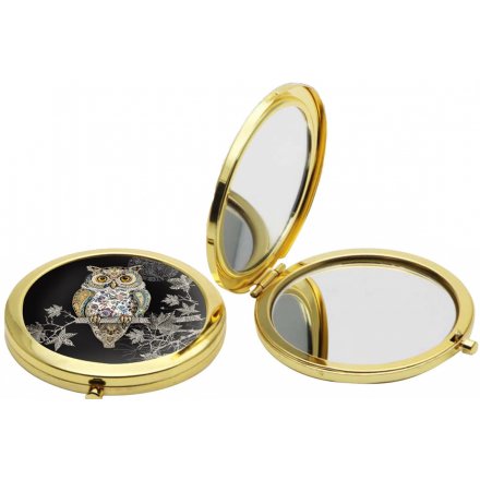  A beautiful golden toned compact mirror, perfectly finished with an illustrated wise old owl design