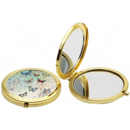  Complete with a beautifully patterned butterfly decal, this golden rimmed compact mirror will be sure to make a lovely 