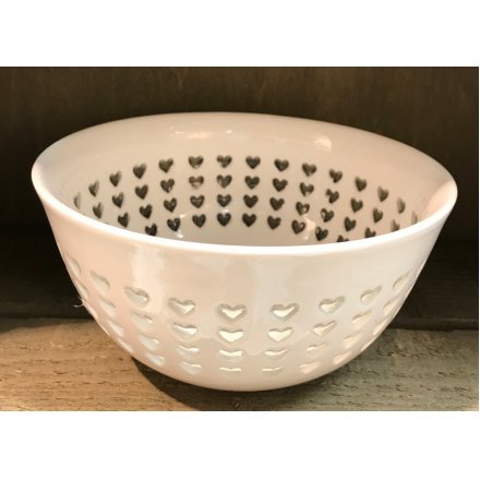  A simple ceramic bowl with an added cut out heart decal. A perfect addition to any themed space of the home 