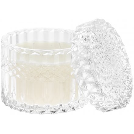  A beautifully patterned glass candle pot with a crystal inspired embellishment and 'Vanilla Honey' scented wax centre 