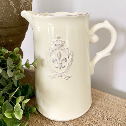  A beautifully smooth glaze finished ceramic jug, complete with a embossed Fleur De Lis