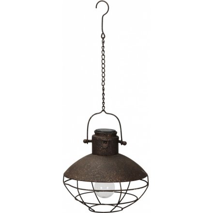  Bring a distressed charm to your garden decor with this stylishly rustic hanging metal solar light 