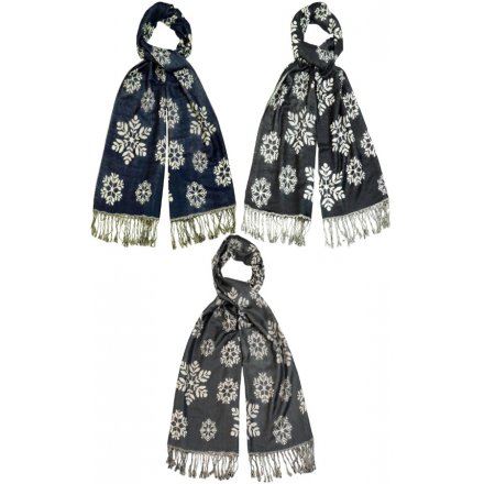 A mix of 3 stylish pashmina scarves each with a bold snowflake design. A chic seasonal accessory and gift item.
