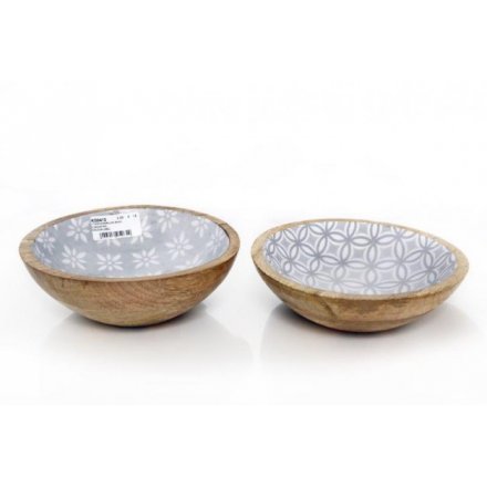 A mix of three wooden bowls with decorative blue pattern.