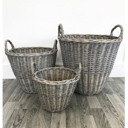 A rustic set of three round willow baskets. A great addition to many rustic homes.