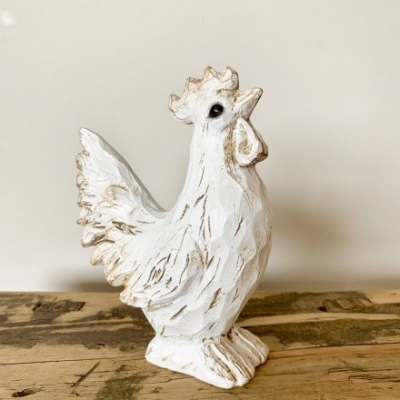 A charming white hen decoration with a carved wooden effect finish. A country living interior accessory and gift item.