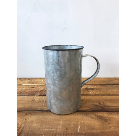 A rustic and unique camping cup style planter/vase with a distressed finish.