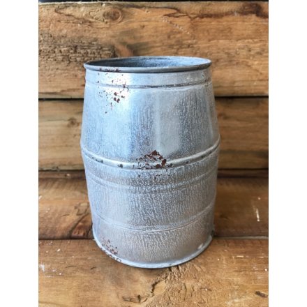A zinc metal planter with a distressed finish. A unique planter and decoration for the home.