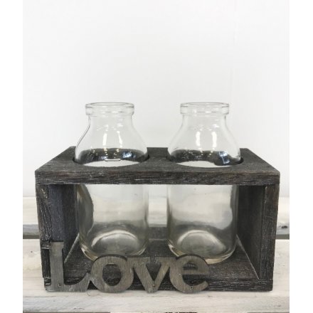 Display herbs or handpicked stems in this gorgeous rustic bottle holder with love sign.