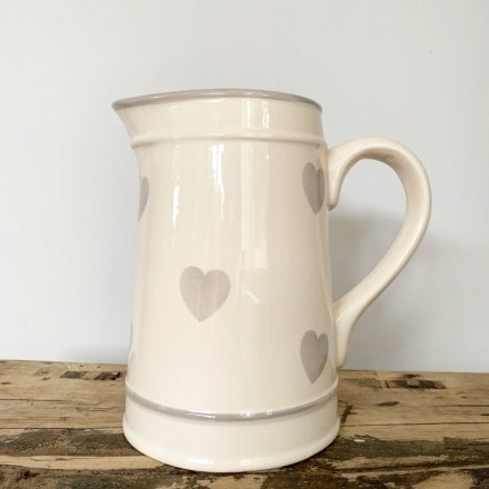 A ceramic Jug with added grey heart detailing 