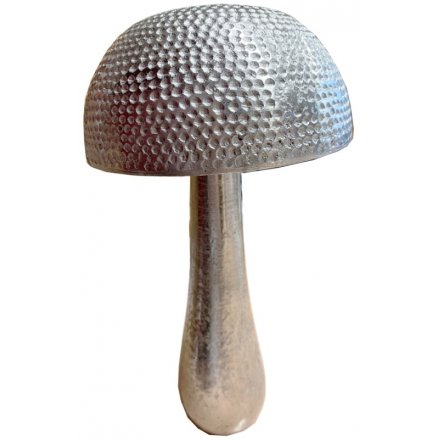 A beautiful decorative mushroom ornament with a textured surface. An ornate and on trend decorative accessory.