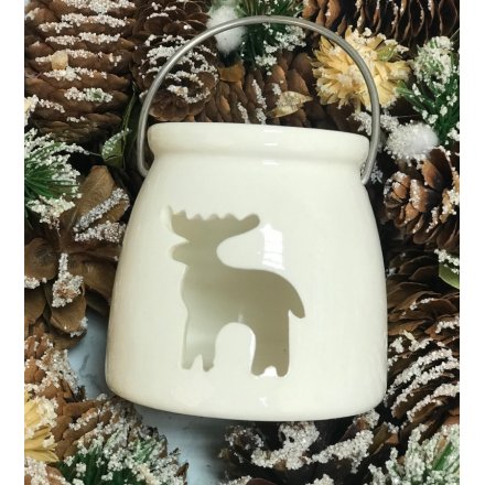  A simple yet sweet porcelain lantern, set in a glossy white tone and finished with a reindeer opening and metal handle