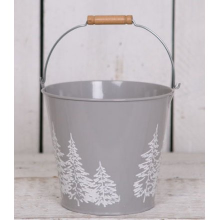   A stylishly simple grey metal bucket featuring a white forest outline