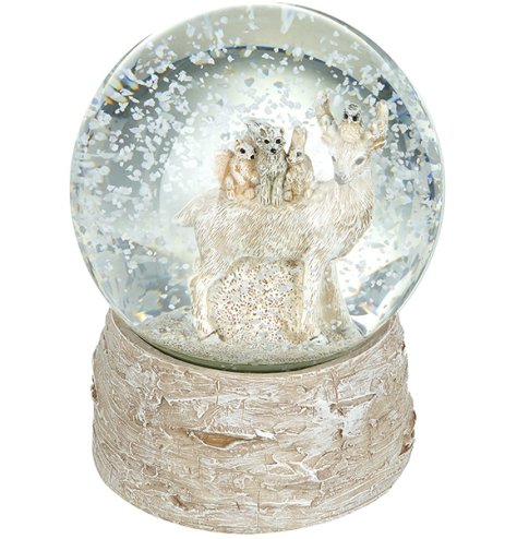 A woodland inspired glass snow globe with a bark effect base. Inside discover a reindeer with woodland friends.