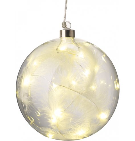 A chic glass bauble filled with white feathers and sparkling LED lights.