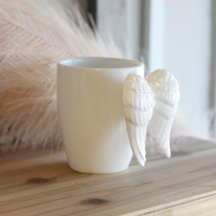 A simply angelic themed Ceramic Mug featuring a beautiful pair of wings as the handle 