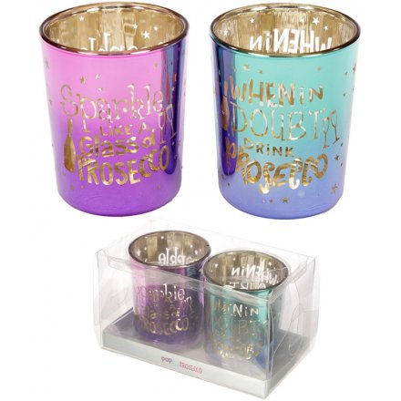  A fabulous set of glass t-light holders featuring iridescent purple and blue tones and chirpy script quotes 