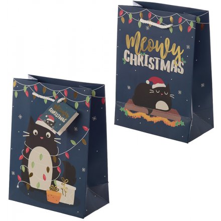 Bring a purrfect touch to your gift giving events with this charming navy blue gift bag covered with a pretty kitty dec