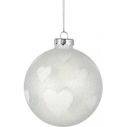 A chic and sparkly glitter bauble with white hearts. A must have festive decoration this season!