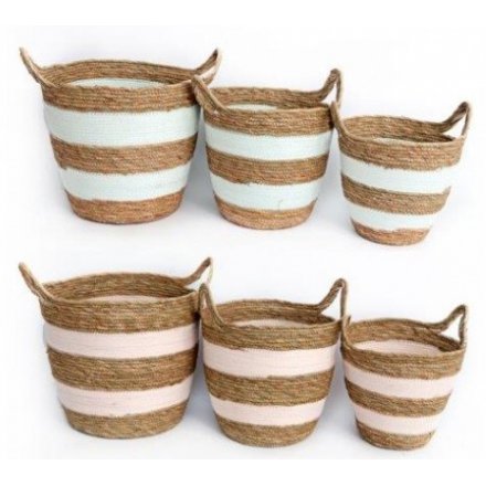 An assorted set of coloured and sized woven baskets, perfect storage accents for any home 