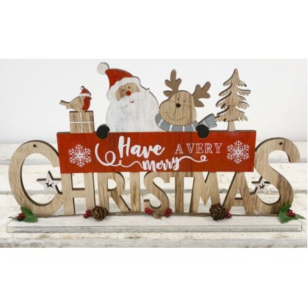  A natural wooden plaque featuring a cut Christmas Text and added festive friend decal 