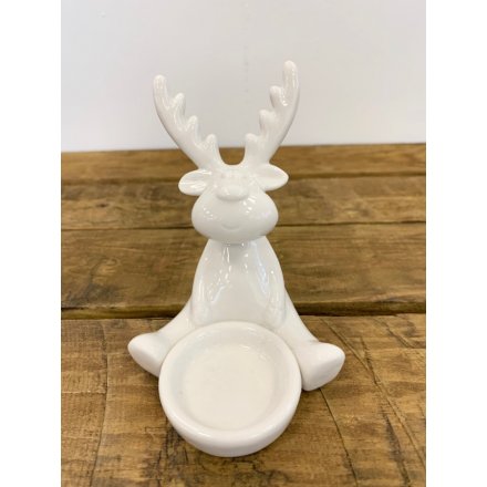  A Sleek and Simple themed reindeer tlight holder, set with a smooth ceramic finish 