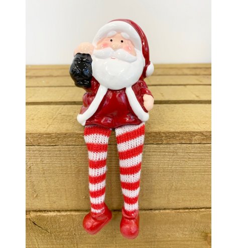 An adorable friendly sitting Santa with long dangly legs. Other characters also available to complete the set.
