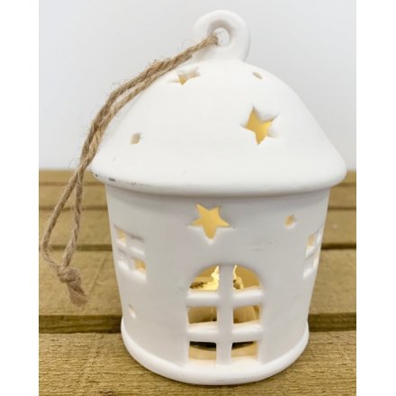 this charming little white ceramic house hanging decoration will be sure to hang perfectly amongst any additional decor 