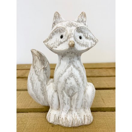  A cute little white washed fox decoration with an added wood carving inspired decal 