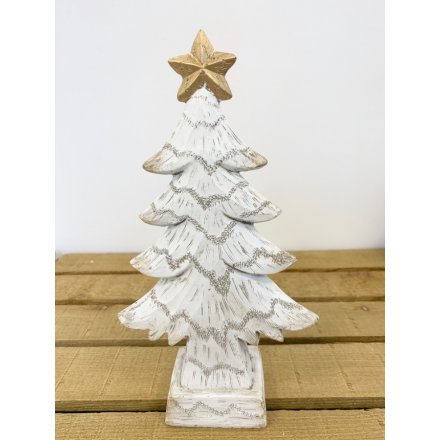 A resin based Christmas tree with a wooden effect. In a distressed white finished with a golden star on top.
