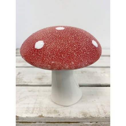   Add this red toned ceramic mushroom to any Winter Woodland inspired home displays for an added charm 