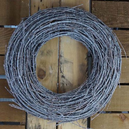 Made up of only white washed twigs, this large chunky wreath will be sure to hang perfectly on any front door during Chr