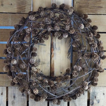 this charmingly simple round wreath will be sure to bring a Woodland feel to any home display 