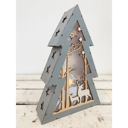  A beautifully rustic inspired standing wooden tree complete with warm glowing LED lights and a Woodland cut scene 