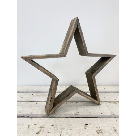 A rustic 3D standing star decoration in a grey natural finish.