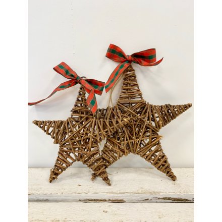 A charming and unique wicker star wreath with a beautiful big tartan bow and jute string hanger.