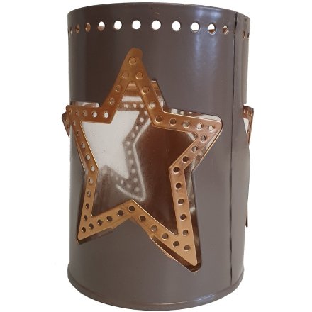 A chic grey candle holder with gold star cut out designs. 