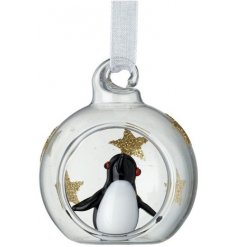   A cute little clear glass bauble with added glitter star decals and a glass Penguin centre 