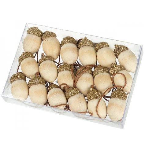 A pack of 18 wooden acorns with gold glitter caps and brown string hangers.