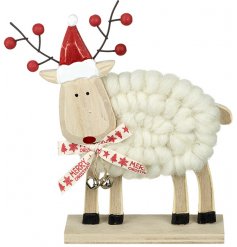 A sweet little furry reindeer complete with a jute string and jingle bells 
