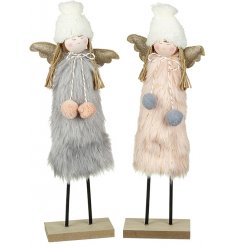 A sweet mix of fuzzy finished standing angel decorations, each set with a grey and blush pink tone 