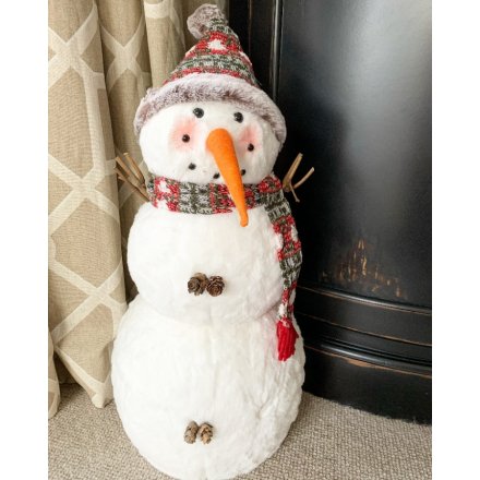  A sweet standing fabric snowman decoration, perfectly set with a woollen hat and scarf 