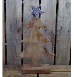 A charming chunky wooden tree with a hammered aluminium star topper. 