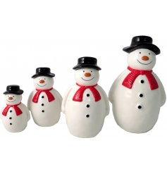 A cute little sitting ceramic snowman complete with a traditional hat and scarf decal 