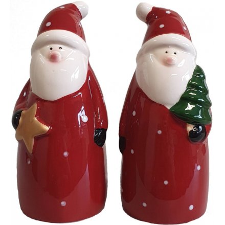 A mix of festive themed standing Santa Decorations