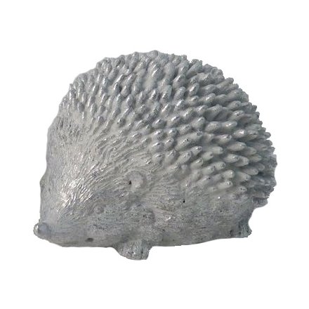 A small resin Hedgehog in a silver tone and coated with a subtle sprinkle of glitter 