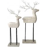 A contemporary inspired Standing Reindeer decoration set with a distressed white washed tone 