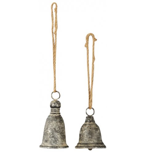 Assorted antique inspired Christmas bells with a distressed, grey washed finish and chunky jute string hangers.